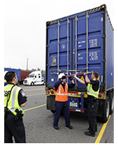 CBP officers inspecting cargo at a land port of entry