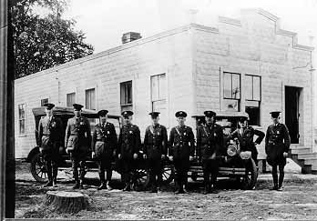 Historical photograph of Houlton Sector Border Patrol Agents lined up in front of the Sector Headquarters.