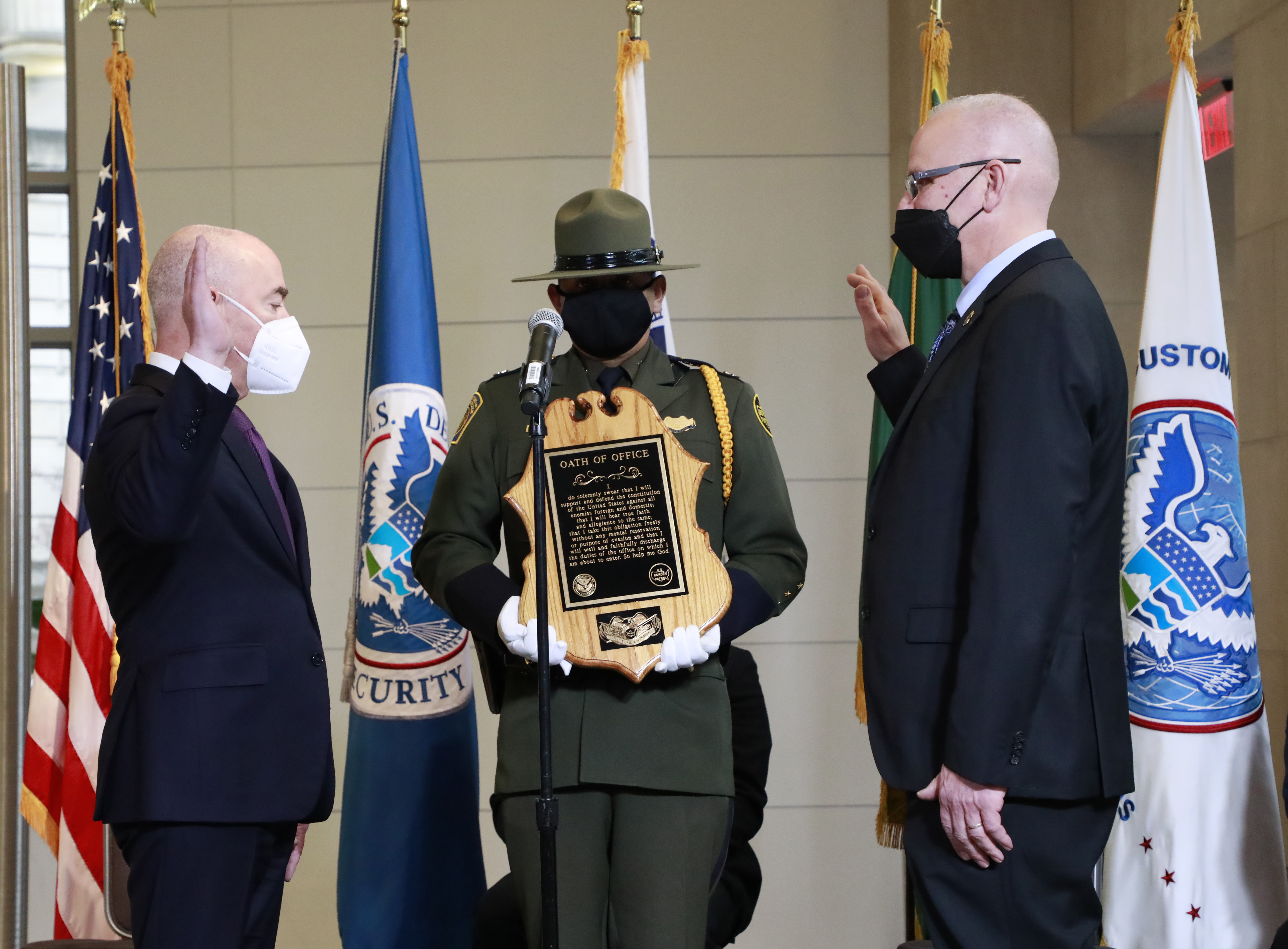 CBP Commissioner Chris Magnus, right, is sworn in by Secretary of Homeland Security Alejandro Mayorkas during the ceremonial swearing in earlier this year.