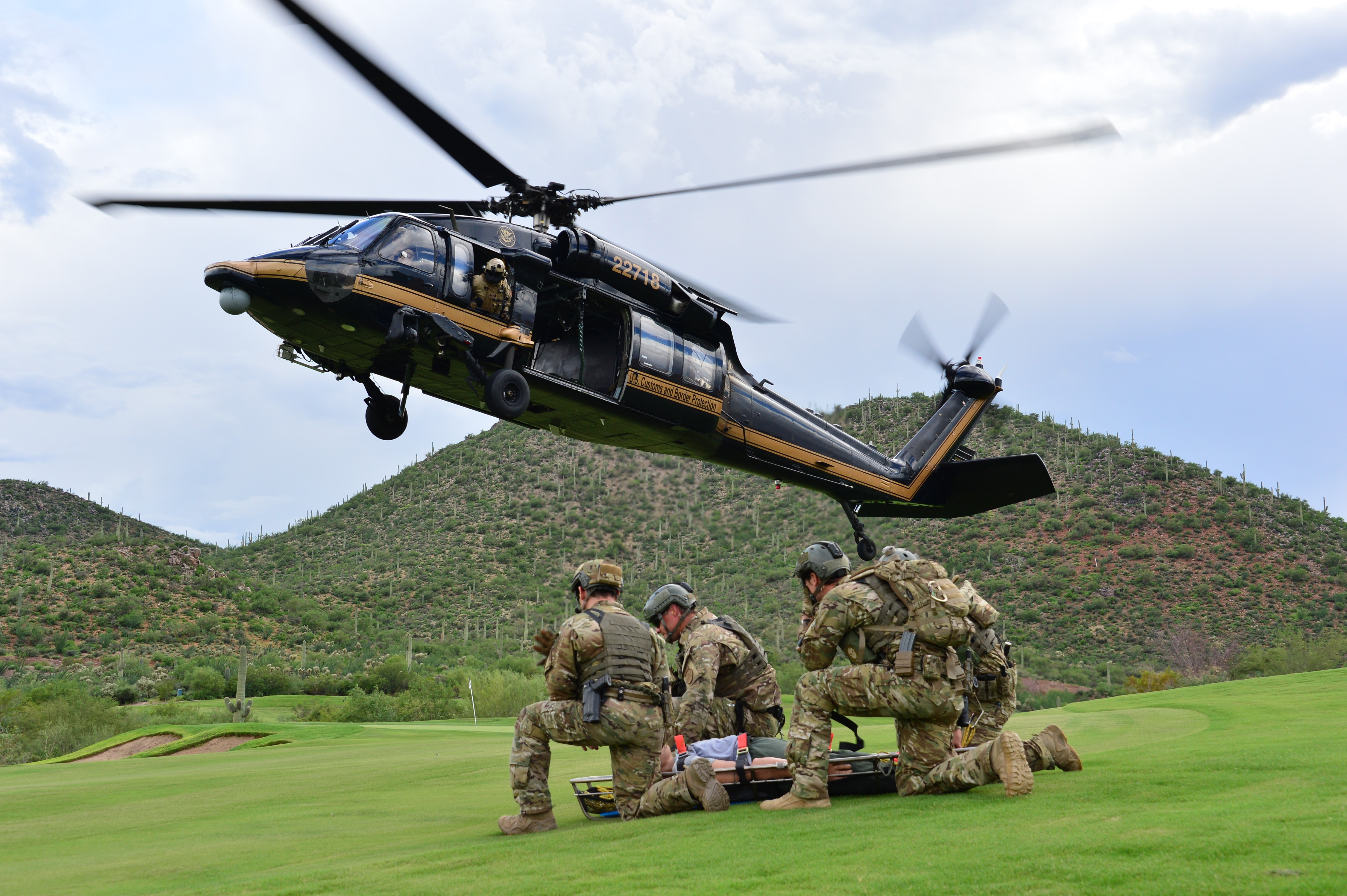 A CBP helicopter and BORSTAR agents in Arizona.