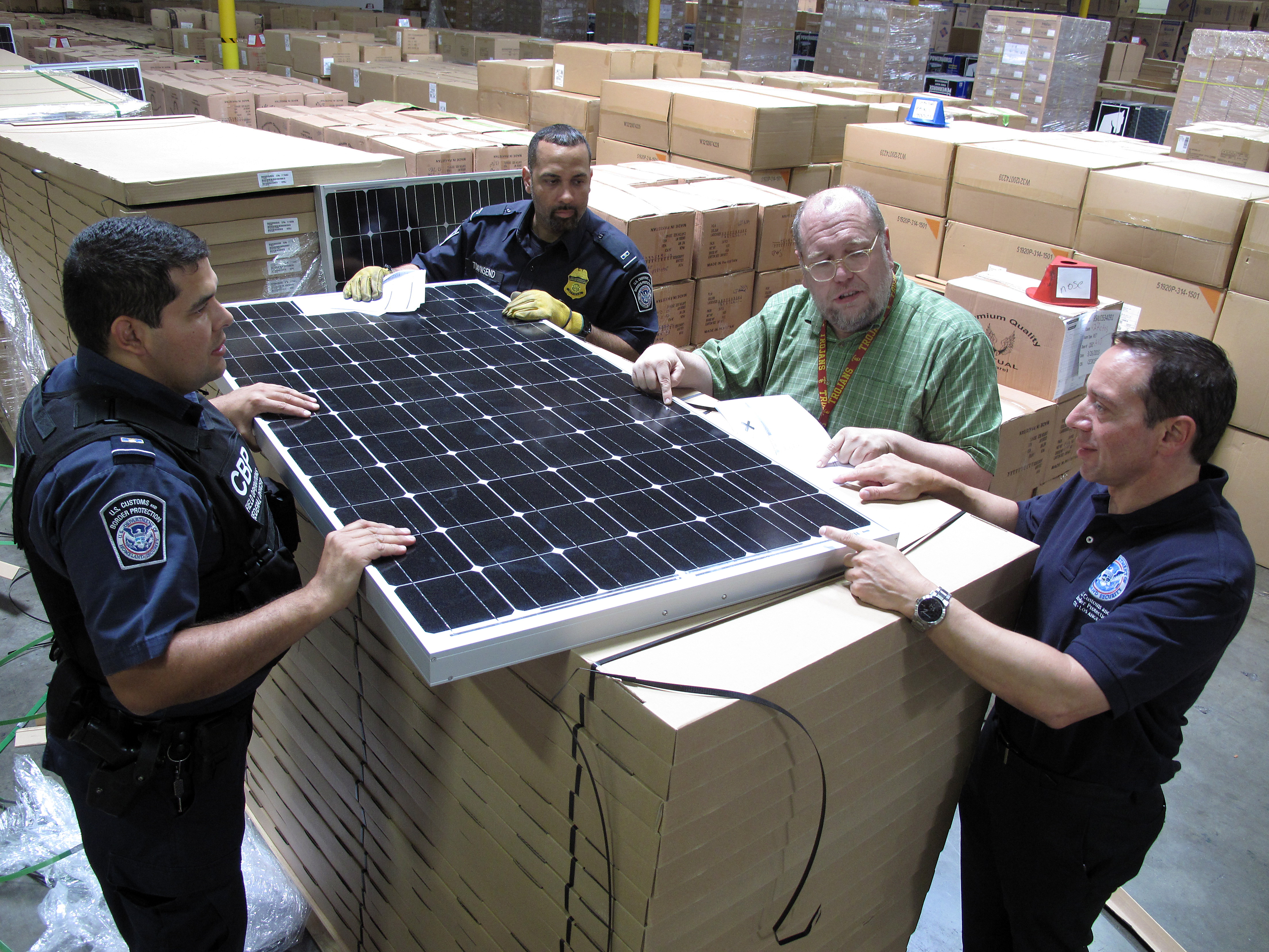 Photo of CBP discussing best practices for solar panel examinations