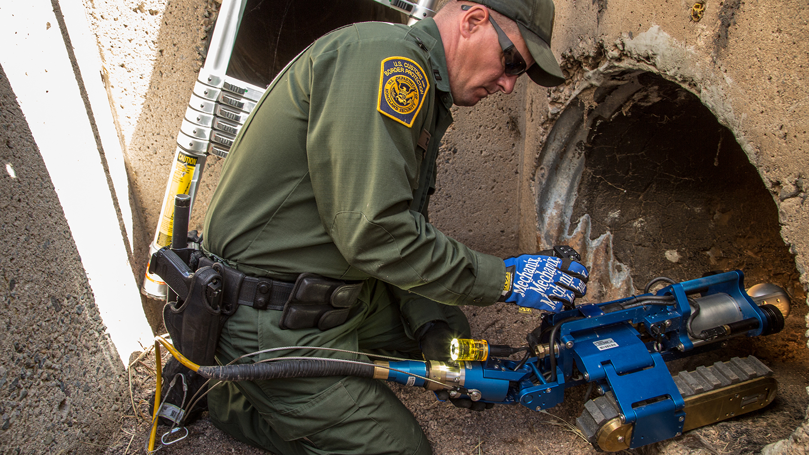 A CBP robot is placed in a drainage pipe for exploration.
