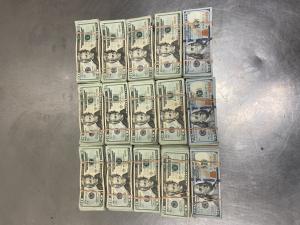 Stacks containing $85,000 in unreported U.S. currency seized by CBP officers during an outbound examination at Pharr International Bridge.