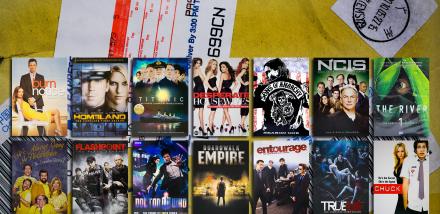 Photo of various DVDs representing the market for fraudulent entertainment 
