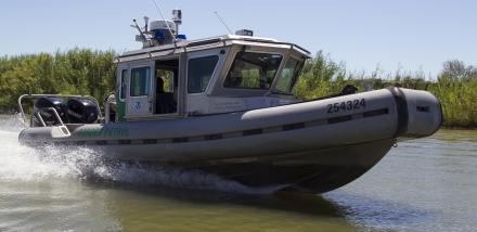 A Border Patrol boat on patrol on the Rio Grande River