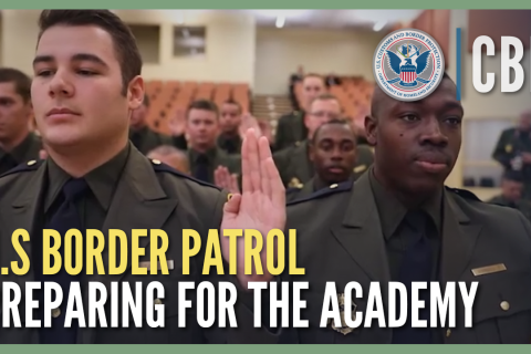 Group of Border Patrol Agents in uniform raising right hand to take an oath