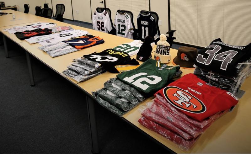 Counterfeit NFL team apparel items seized.