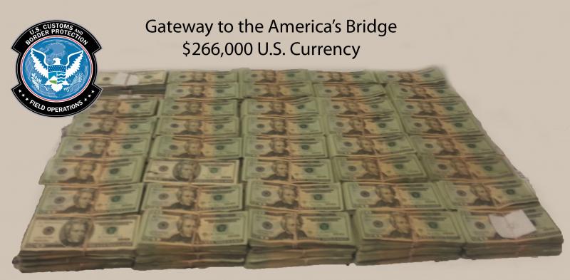 Stacks of bills totalling $266,000 in unreported currency seized by CBP officers and agents at Laredo Port of Entry