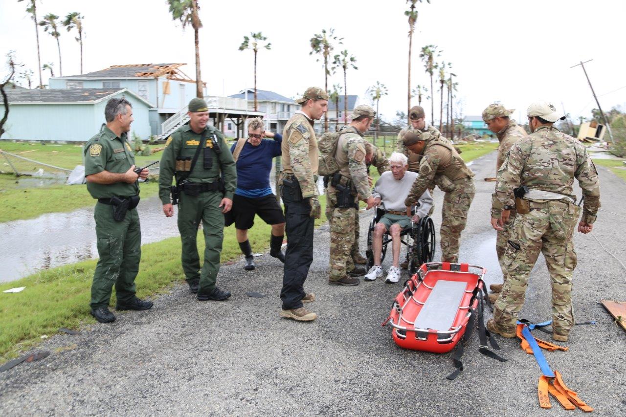 Rio Grande Valley Sector Border Patrol Special Operations Agents assist a disaster survivor trapped on the second floor of his home in Rockport, Texas August 26, 2017. Photo courtesy of U.S. Customs and Border Protection.