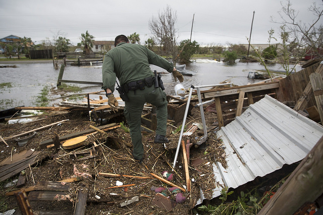 U.S Border Patrol agents Mario Fuentes, left, and Marc Gonzales search a destroyed mobile home for survivors in the wake of Hurricane Harvey near Rockport, Texas. (August 27, 2017) U.S. Customs and Border Protection Photo: Glenn Fawcett