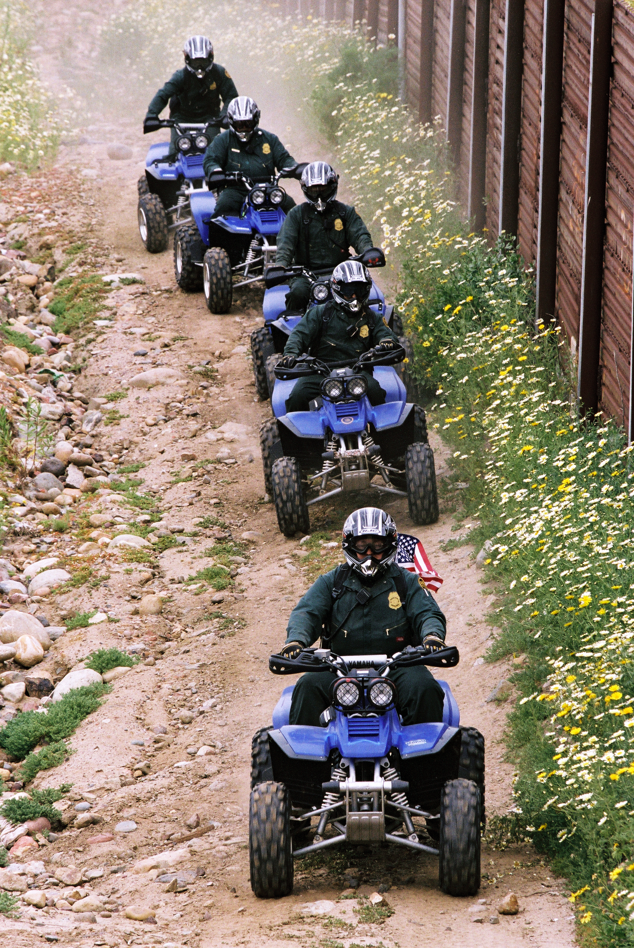 Border Patrol agents makes use of All Terrain Vehicles to patrol along the rugged border with Mexico.