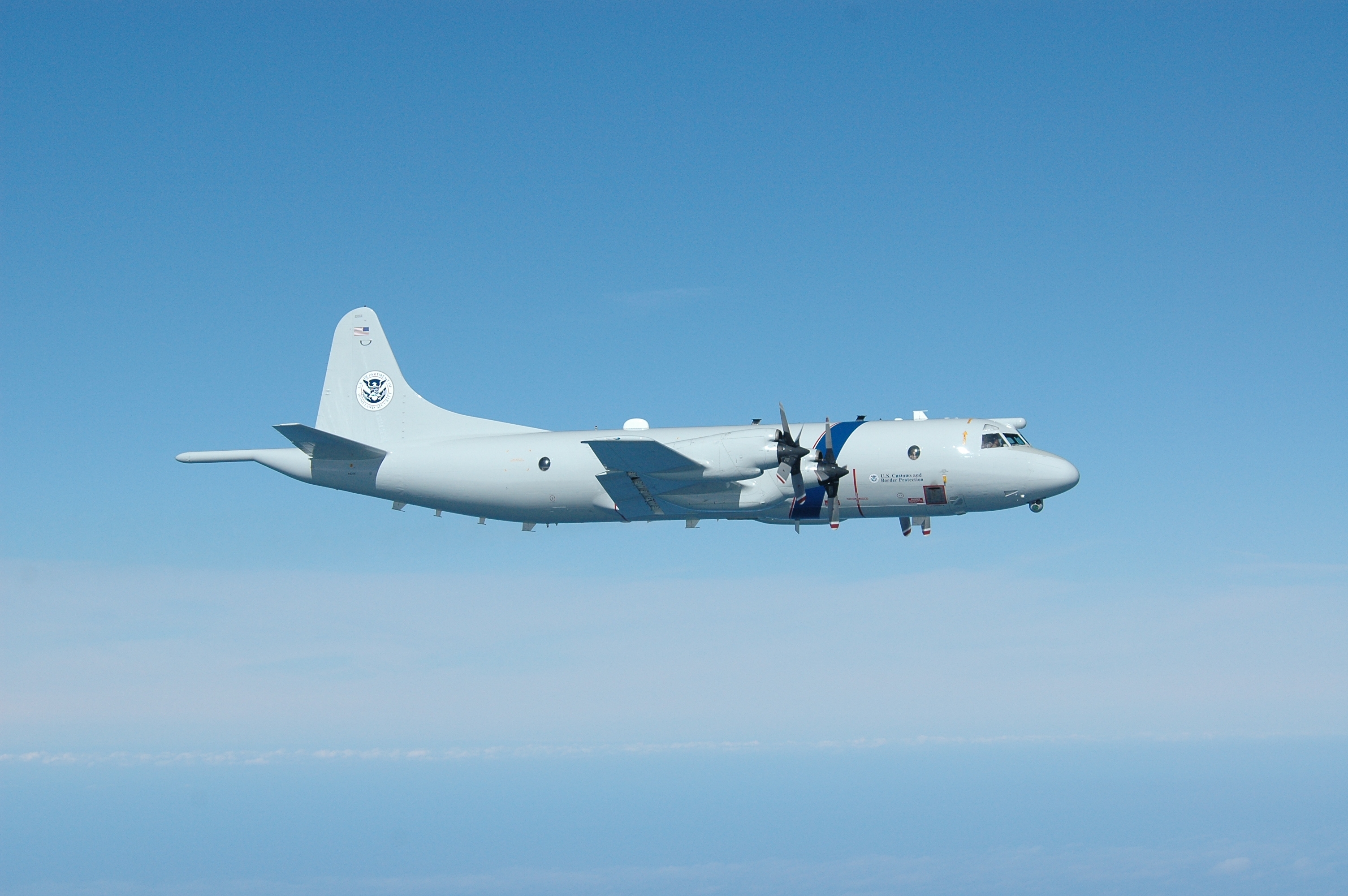 The P-3 Long Range Tracker Aircraft detects and tracks multiple targets and the accompanying aircraft intercepts, identifies and tracks those suspect targets.