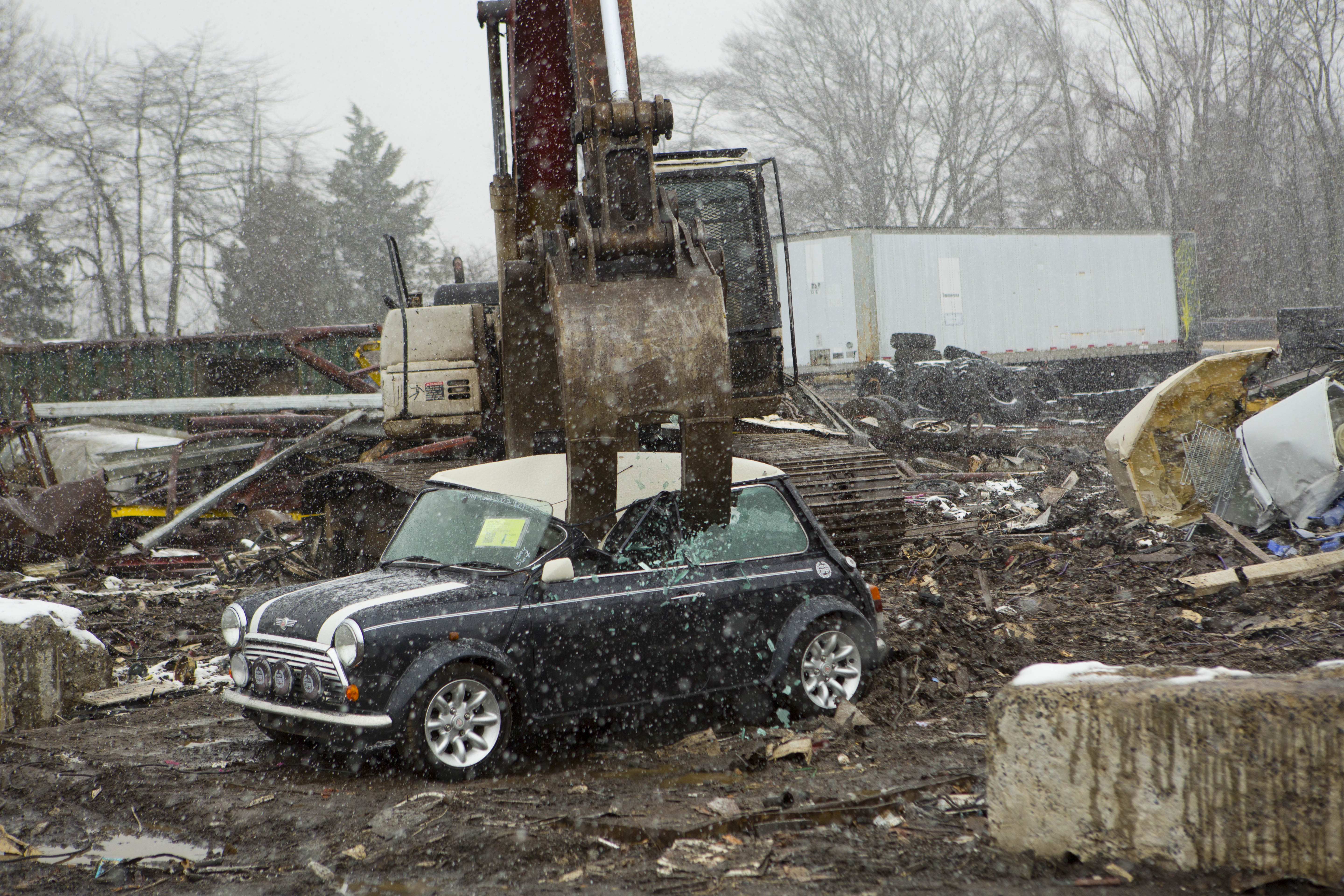 U.S. Customs and Border Protection in conjunction with British Authorities destroy a Mini Cooper that had many violations related to importation. Photo Credit: James Tourtellotte.