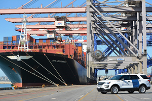 CBP officers arrive to conduct an initial inspection of a docked vessel at the port of Los Angeles-Long Beach in California, the busiest cargo seaport in the nation.   Photo by Jose Teran
