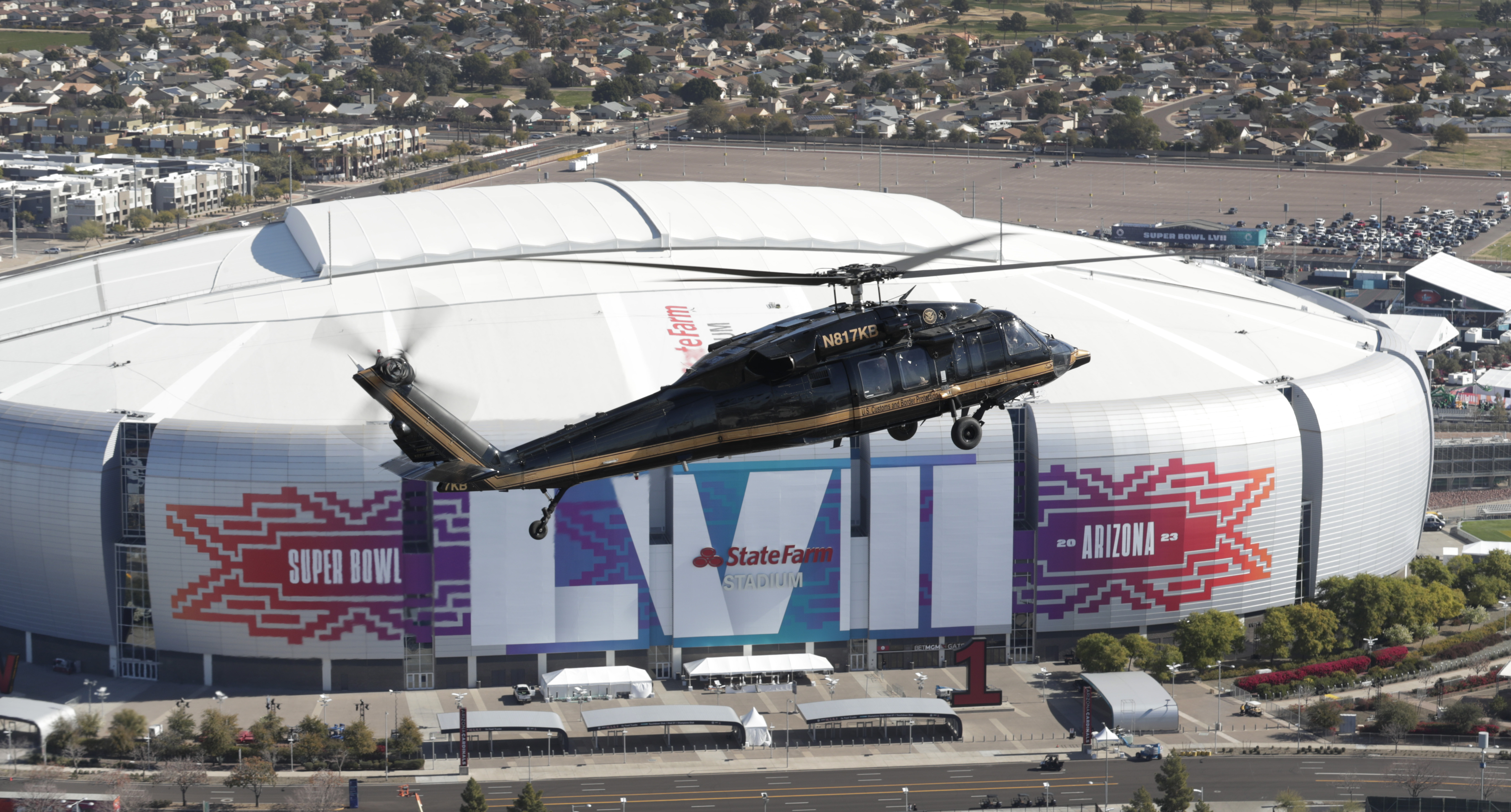 An Air and Marine Operations Black Hawk UH-60 surveils the site of Super Bowl LVII.