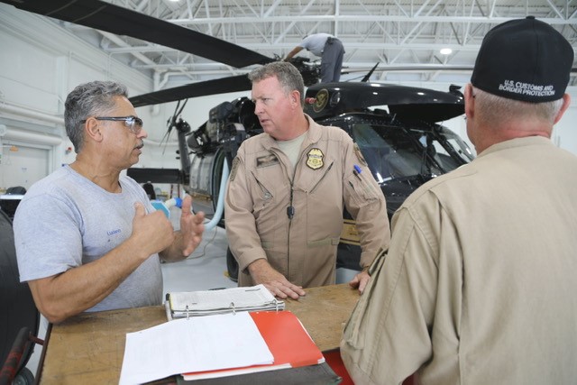 CBP Air and Marine Operations air interdiction agents and a CBP aircraft mechanic make final preparations prior to the arrival of Hurricane Dorian at the Miami Air and Marine Branch in Homestead Fla., Sept. 1, 2019.