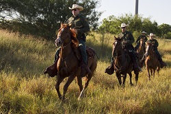 USBP agents on horseback