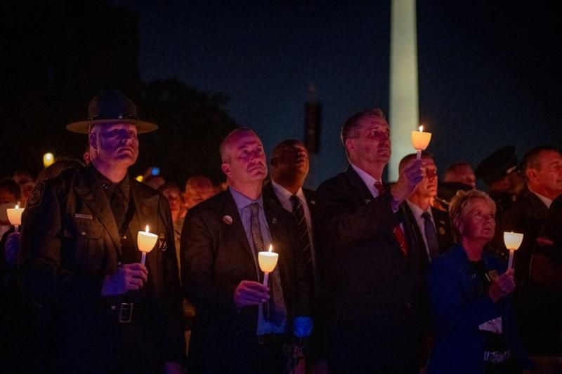 U.S. Border Patrol Deputy Chief of Operations Tony Barker, U.S. Customs and Border Protection Acting Commissioner Troy Miller, and U.S. Customs and Border Protection Acting Deputy Commissioner Benjamine “Carry” Huffman pay tribute to fallen heroes at the 33rdrd Annual Candlelight Vigil.
