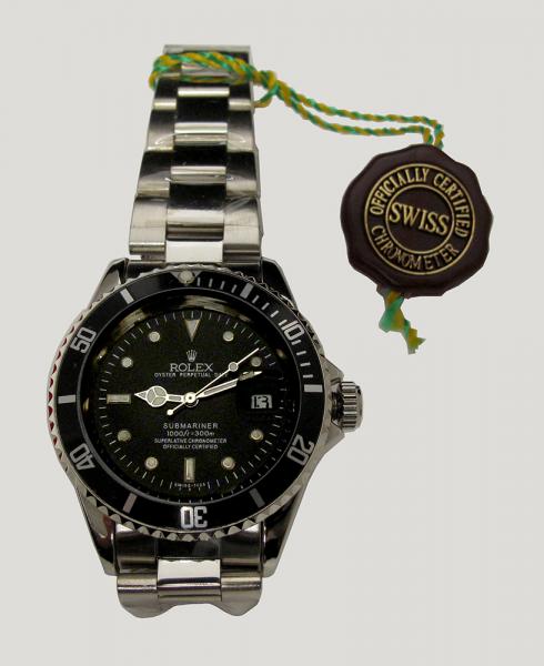 Photograph of the face of a counterfeit Rolex