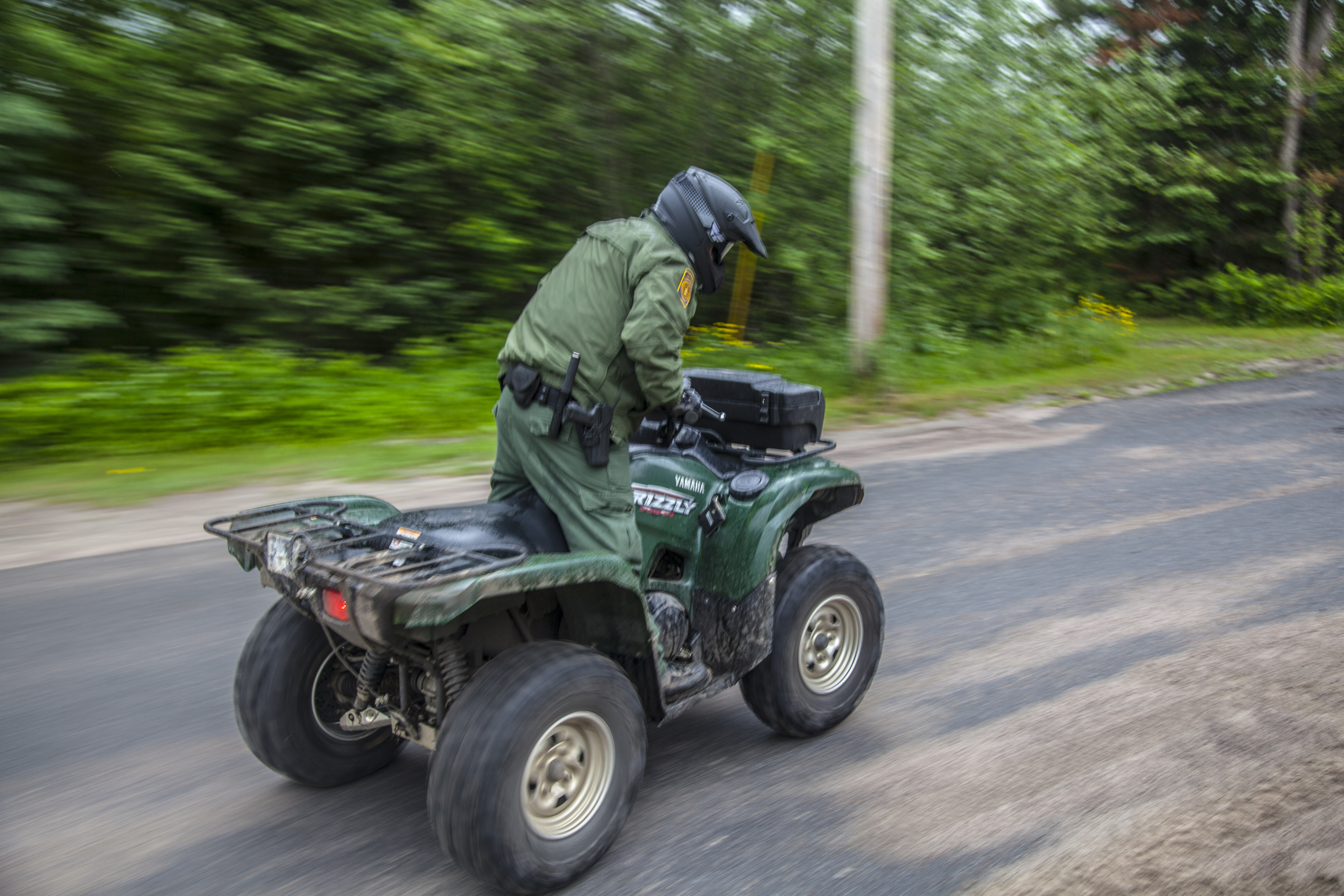 Photo of a Border Patrol agent on an ATV