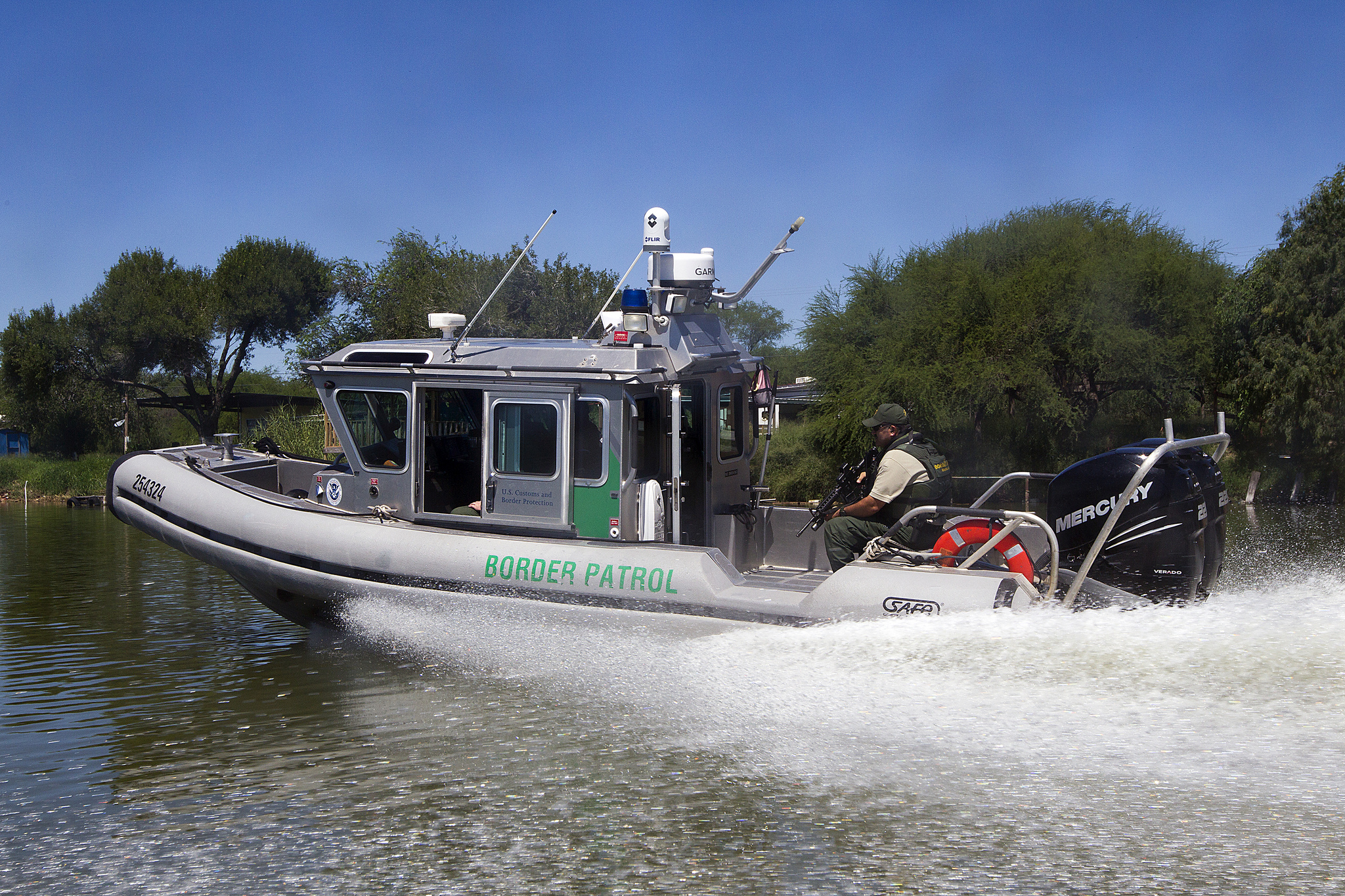 Photo of a Safe Boat patrols the river