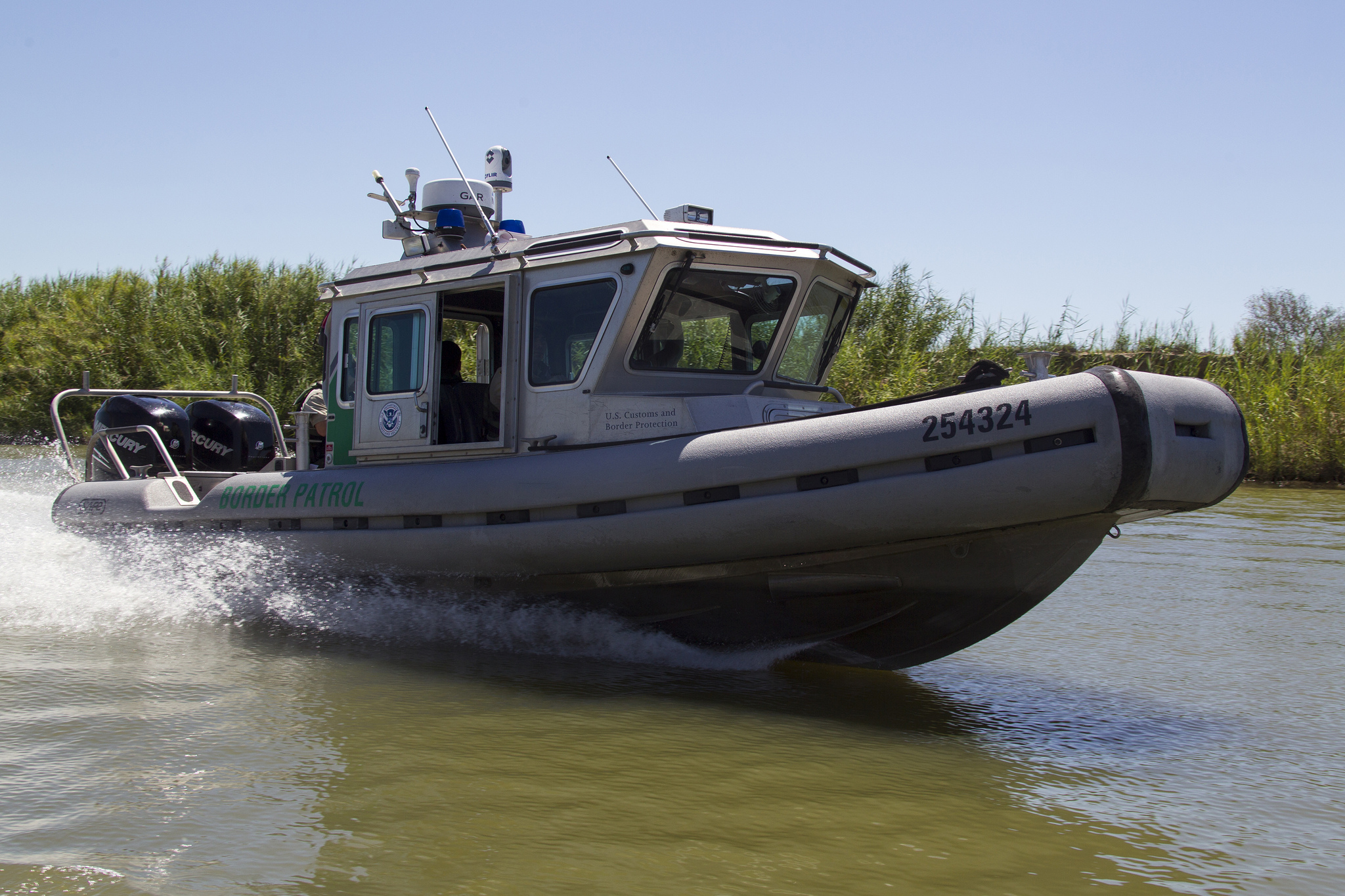 Photo of a Border Patrol boat on patrol on the Rio Grande River