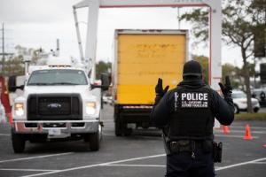 A U.S. Customs and Border Protection officer scans vehicles and shipments entering the Raymond James Stadium area prior to Super Bowl LV to ensure no contraband enters the stadium. Photo by Jerry Glaser