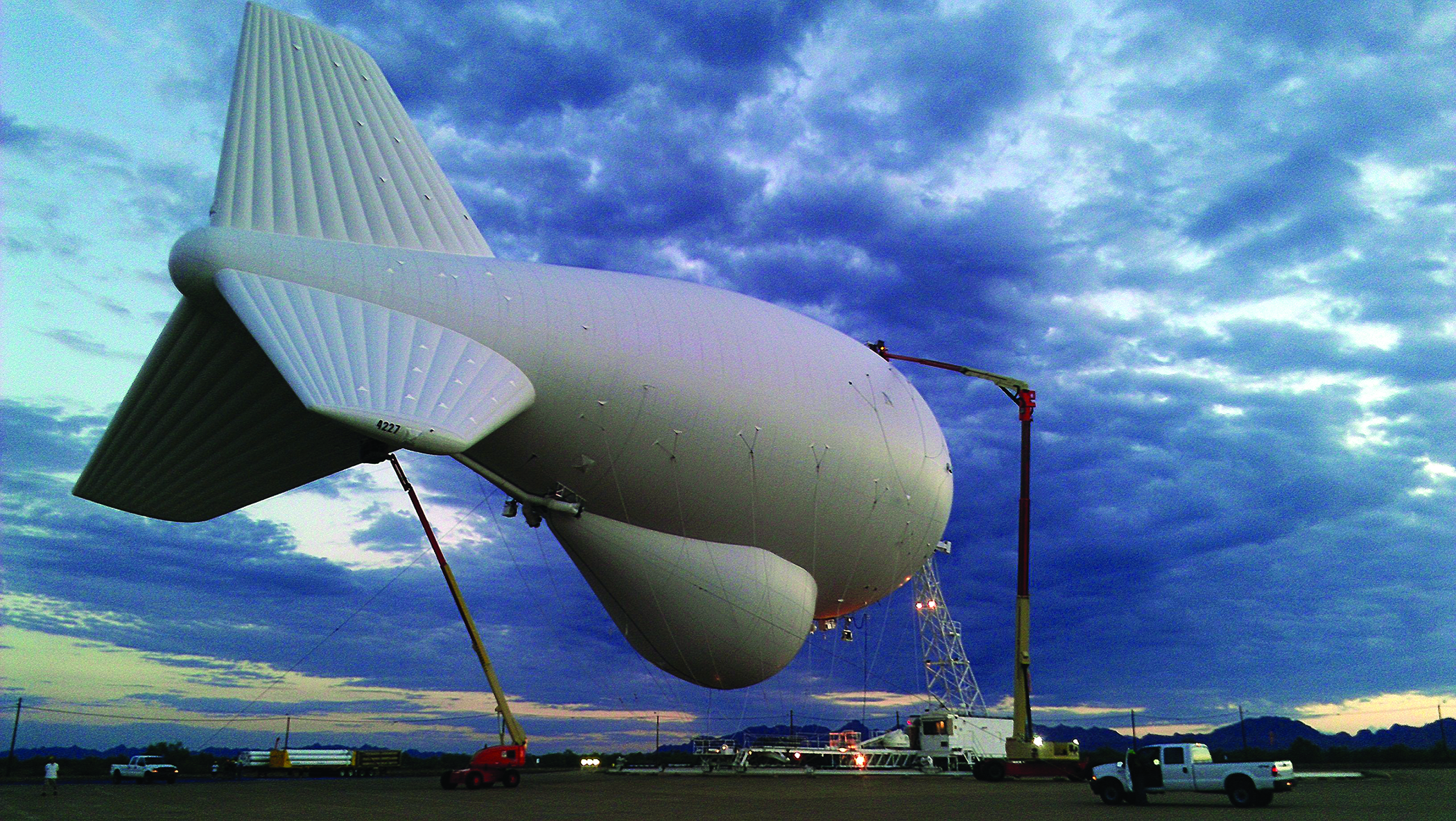 Photo of an aerostat tethered to the ground