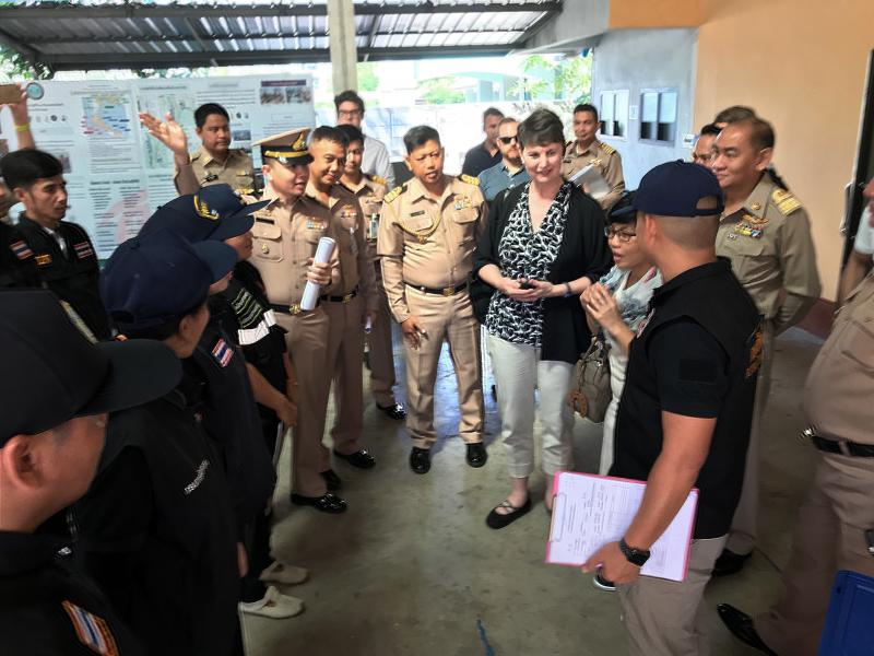 Royal Thai Navy officials at the port of Samut Sakhon explain how port inspections are carried out to Brenda Smith, the Office of Trade’s executive assistant commissioner.