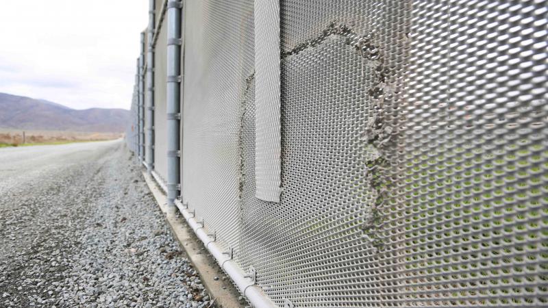 The newer secondary wall – while a much better deterrence than the original landing mat fencing – is still vulnerable to modern, battery-powered cutting tools and emphasizes the need for an even more substantial structure.