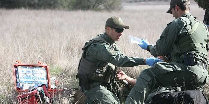 Border Patrol agents administer fluids