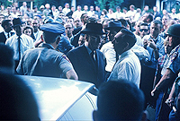 Crowds gather to protest Meredith's enrollment at the University of Mississippi. Copyright Estate of Donald James Proehl.