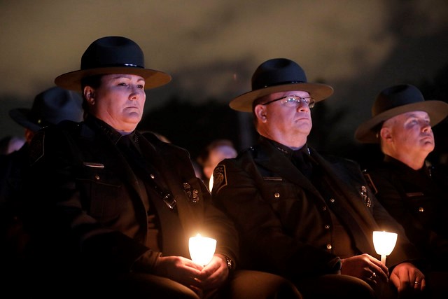 U.S. Border Patrol Chief Carla Provost and Deputy Chief Scott Luck watch as the names of 371 fallen law enforcement officers are read during the 31st Annual Candlelight Vigil held on the National Mall in Washington, D.C., May 13. Photo by Glenn Fawcett