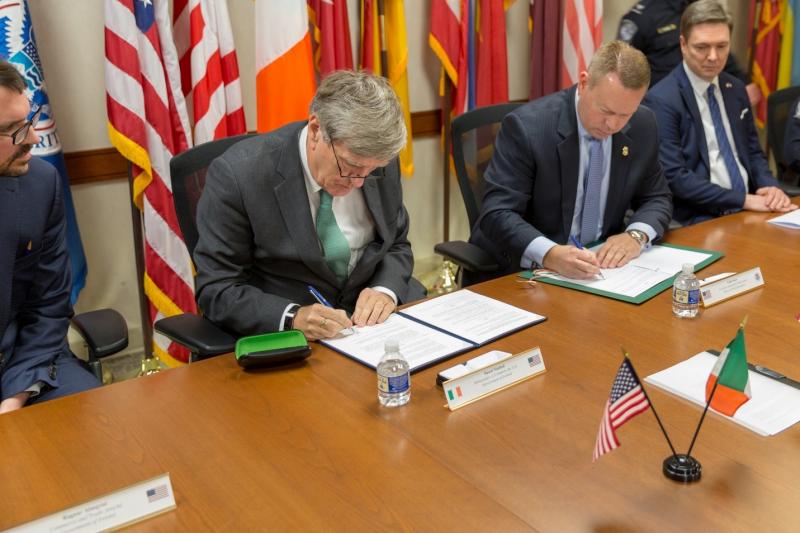 Irish Ambassador Daniel Mulhall (left) and CBP Executive Assistant Commissioner Todd Owen (right) sign an agreement to expand preclearance in Ireland Tuesday at CBP headquarters in Washington, D.C. CBP photo
