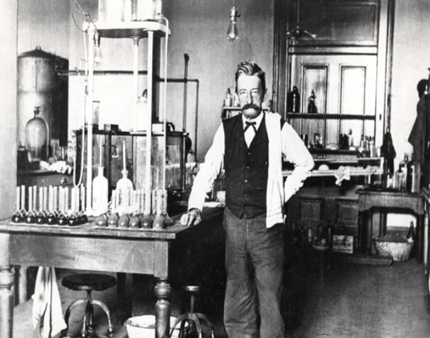 Chief Chemist Walter L. Howell stands in the laboratory in the U.S. Custom House in New Orleans, Louisiana
