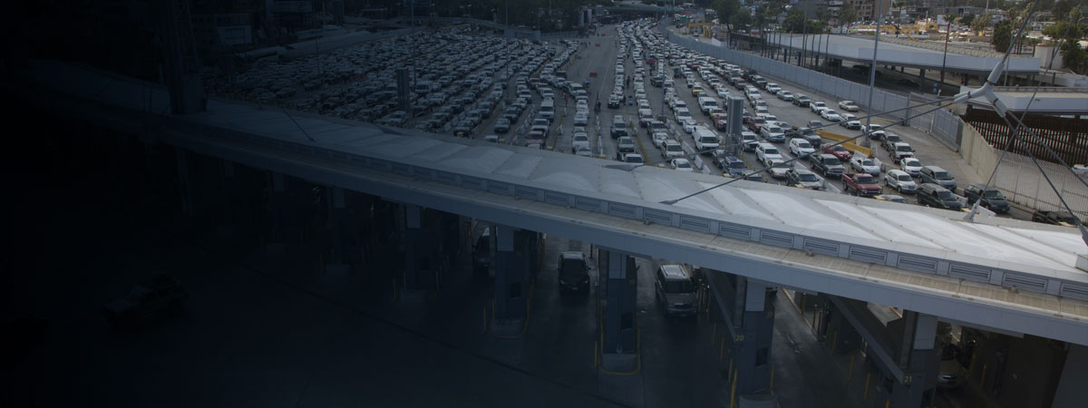 Cars lined up at a CBP port of entry.
