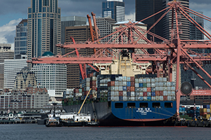 A container ship is docked at the port of Seattle in Washington state