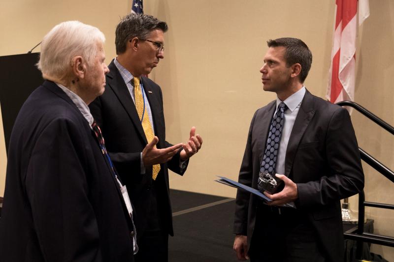 CBP Commissioner Kevin McAleenan confers with members of the Canadian/American Border Trade Alliance. Photo by Donna Burton