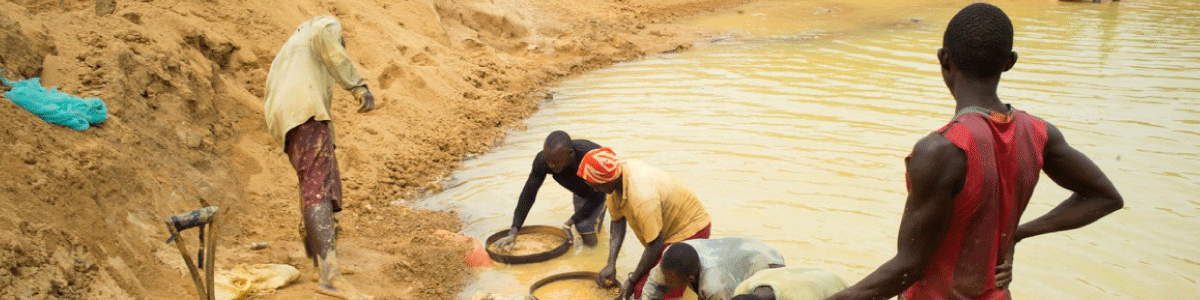 Forced labor image of men mining a river