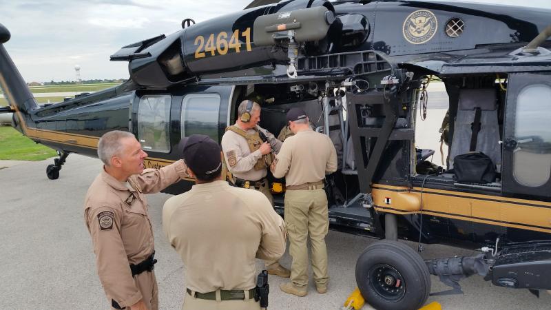 Air and Marine Operation pilots and air interdiction agents conduct pre-flight checks.  AMO air crews flew four UH-60 Blackhawks from Tucson and one from San Diego to AMO’s San Angelo Air Unit as part of CBP efforts to support local, state and federal response efforts. 