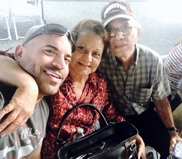 After evacuating from Puerto Rico, a CBP family reunites at Miami International Airport. From left, Felix  Marcos Parrilli, CBP agriculture specialist, Tampa International Airport;  Margarita Cruz Parrilli; and Felix Parrilli Sr.
