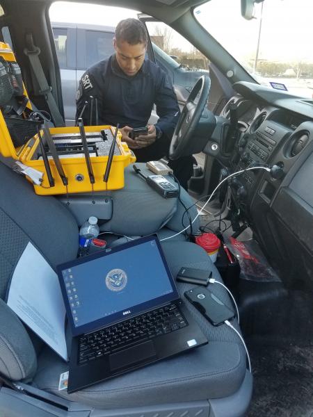 A CBP special response team operator establishes a mobile command center to help coordinate the federal response following the impact of Hurricane Michael in Panama City, Florida, Thursday. 
