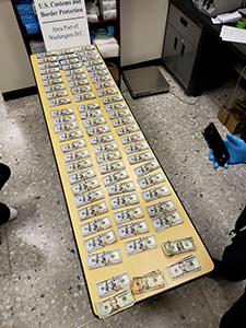 U.S. Customs and Border Protection officers seized $68,000 in unreported currency from a Nigeria-bound family at Washington Dulles International Airport on December 7, 2023.