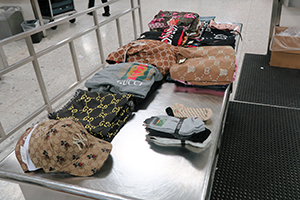 U.S. Customs and Border Protection officers at Washington Dulles International Airport seized counterfeit consumer goods, appraised at more than $500,000 if authentic, from a Laurel, Maryland woman on May 24, 2022.