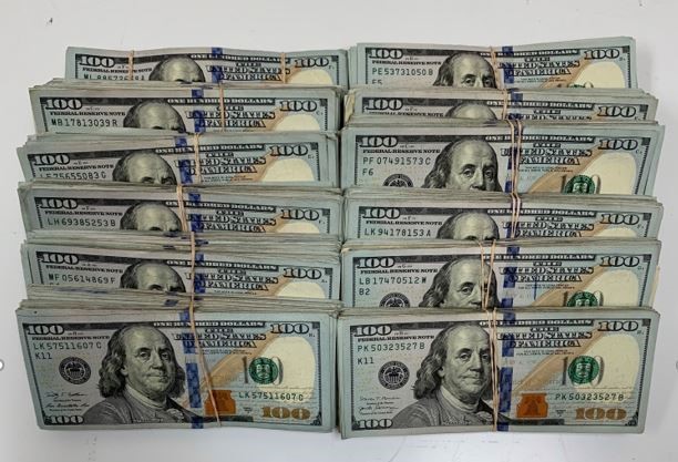 Stacks containing $114,294 in unreported currency seized by CBP officers at Hidalgo International Bridge