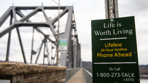 A "Life is Worth Living" suicide prevention sign is attached to a pole at the start of the sky walk on the Rip Van Winkle Bridge in Catskill, NY on Tuesday, November 17th, 2020. 