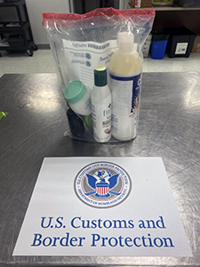 A Dominican Republic national was arrested on felony drug possession charges after U.S. Customs and Border Protection officers discovered cocaine and methamphetamine concealed inside hair and skin care product containers during a baggage inspection at Philadelphia International Airport on November 23, 2022.