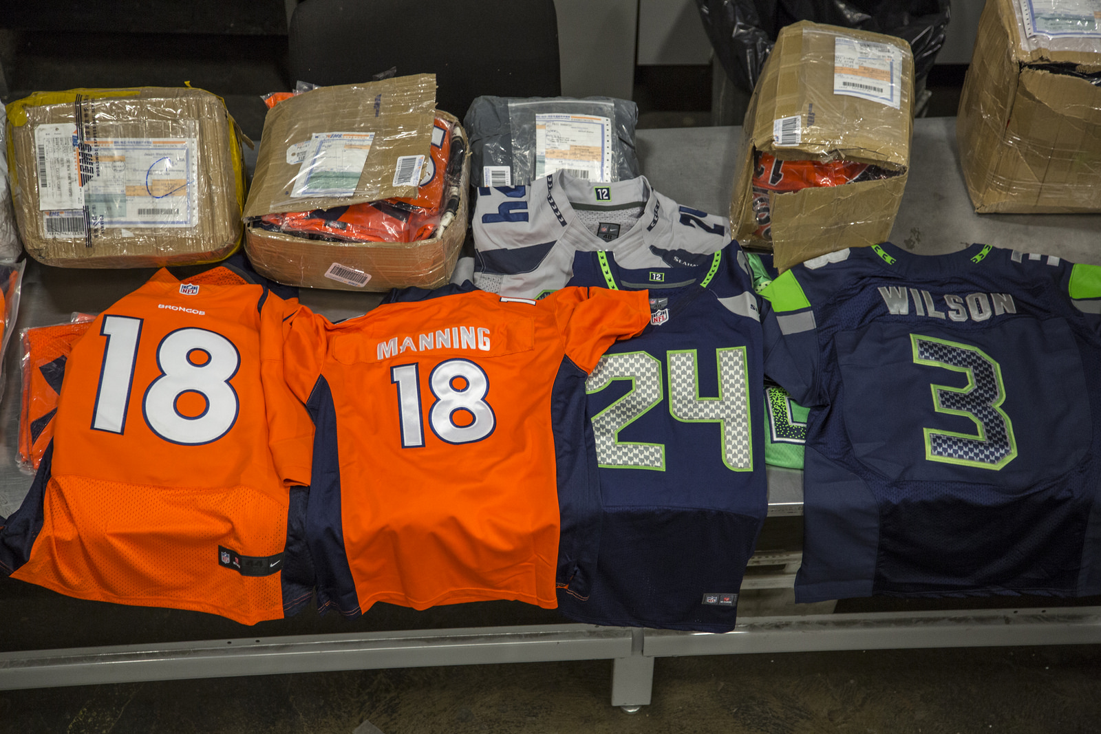 Piles of counterfeit football jerseys.