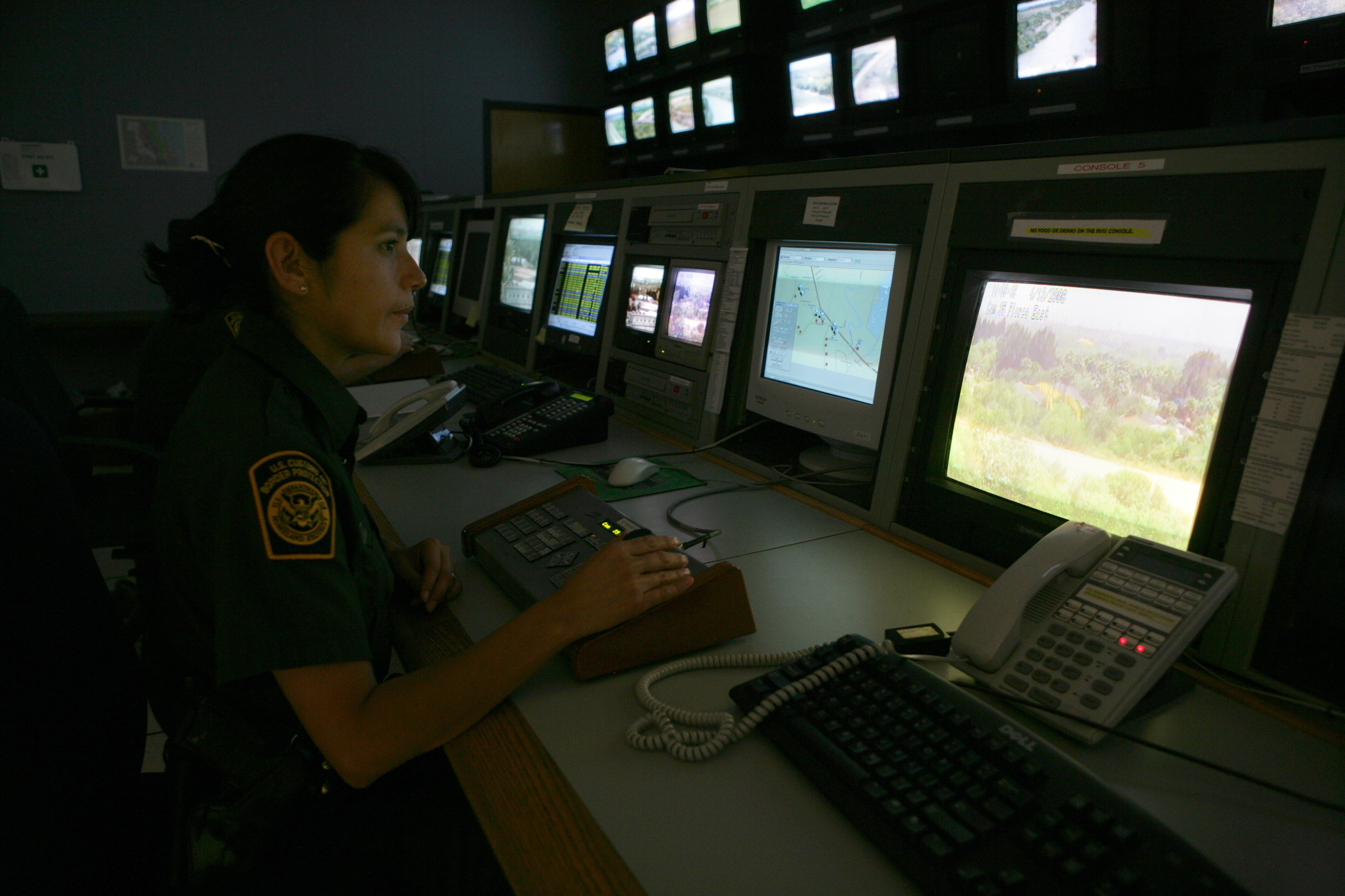 A U.S. Border Patrol Agent operates remote camera systems located along the U.S. border trying to locate illegals immigrants.