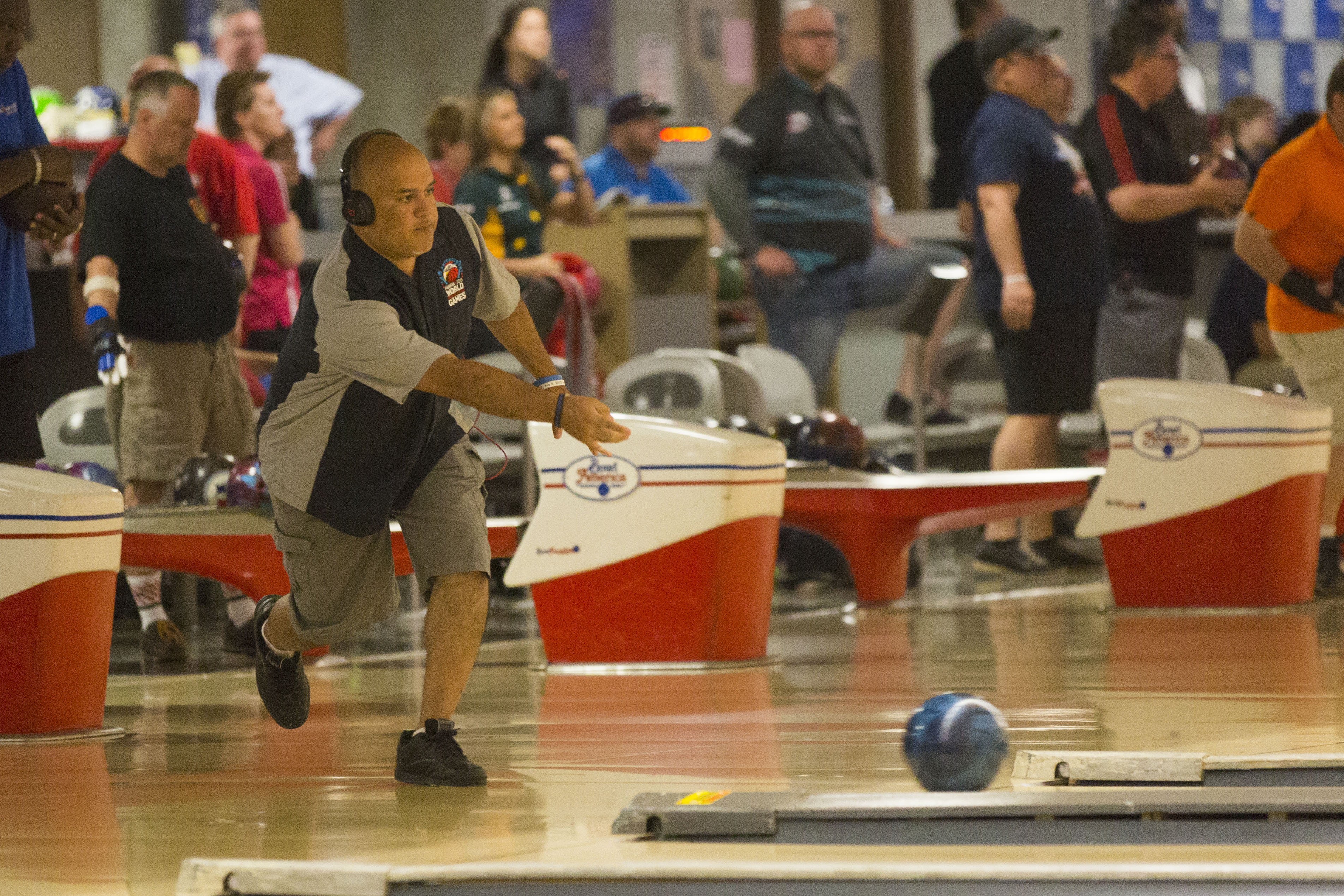 Hector Arredondo, CBP officer from the Sumas, Washington, goes for a strike at the 2015 World Police & Fire Games bowling tournament. Photo by James Tourtellotte